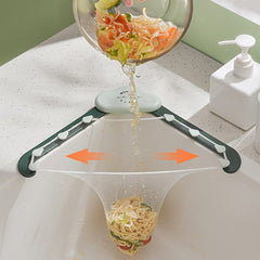 Collapsible strainer being used to drain noodles from a bowl over a sink.