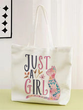 Tote bag with 'Just a Girl' text and floral cat design on a white background