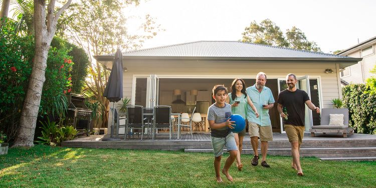 happy Australian family enjoying in the lawn